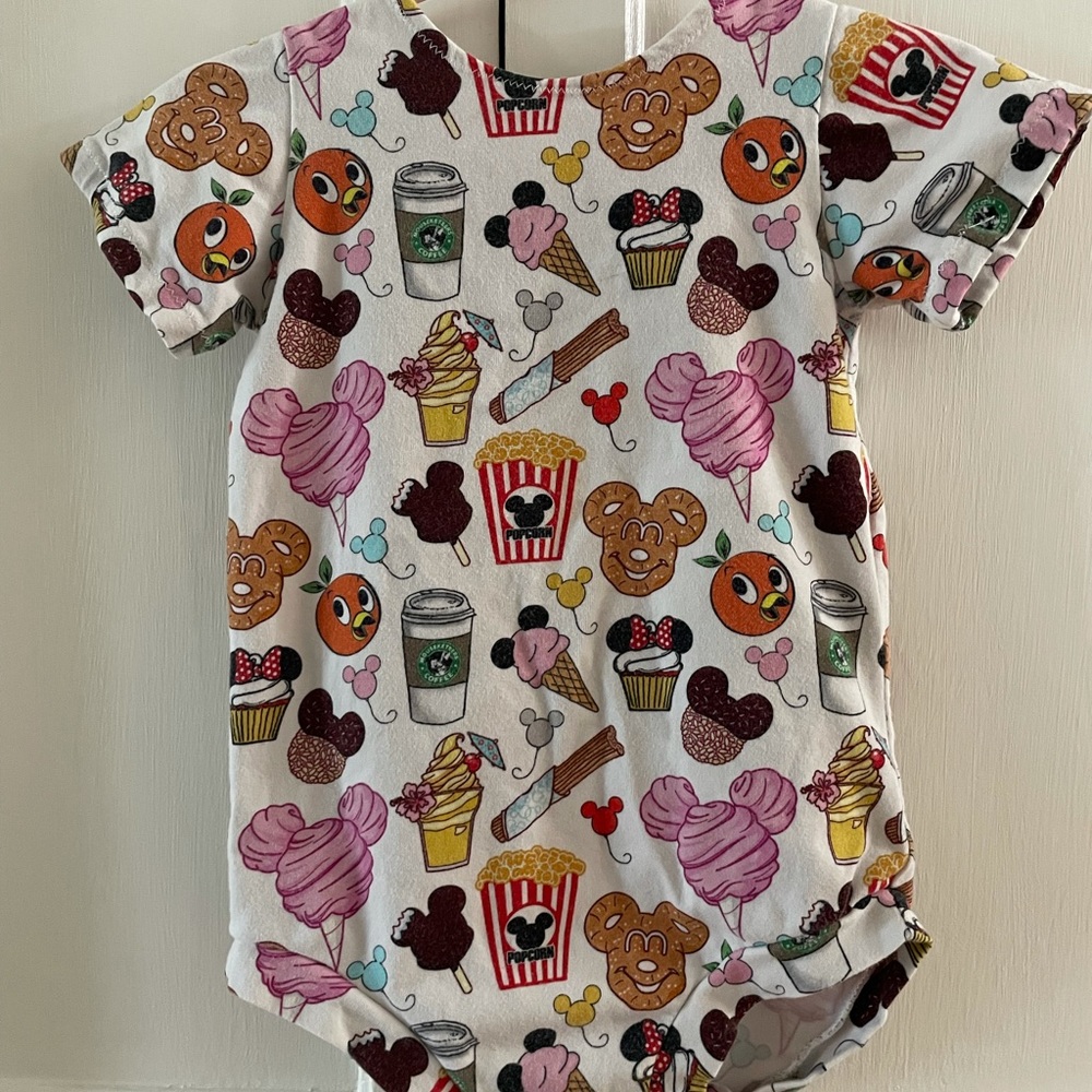 Disney snack print onesie